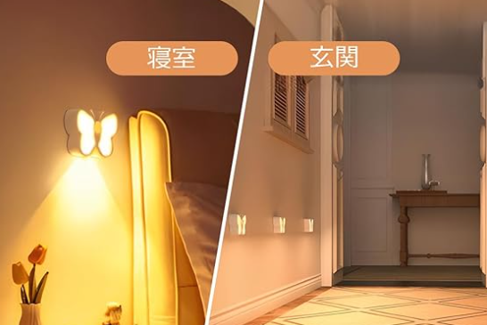 壁にライトを取り付けている様子